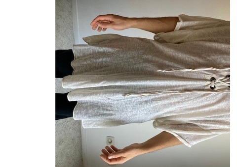 Haut beige lacé