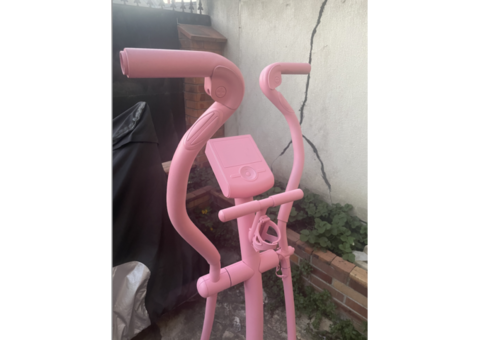 Vélo elliptique rose