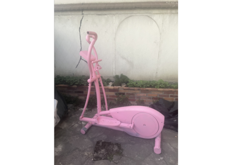 Vélo elliptique rose